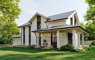 Проект практичного мансардного дома с эркером и пристроенным гаражом