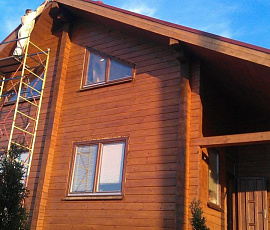 Окраска дома из деревянного бруса: материалы, технология, варианты покраски